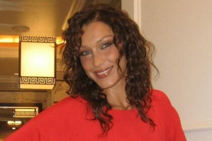 Bella Hadid poses sober in red dress