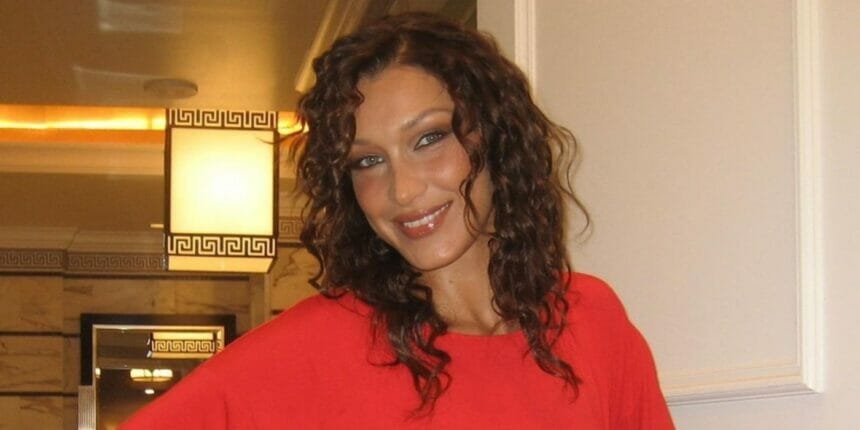 Bella Hadid poses sober in red dress