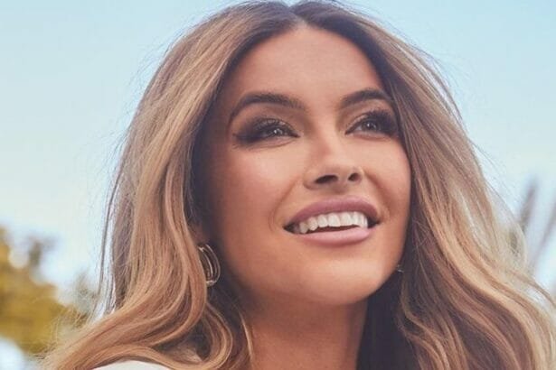 Chrishell poses in white dress