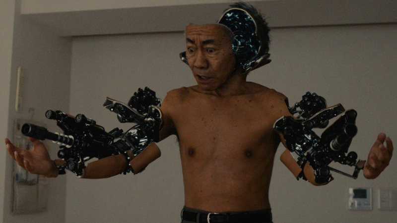 A man sprouts cyborg enhancements in the live-action adaptaiton of Inuyashiki