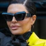 Lisa Rinna in yellow minidress at the Paris Fashion Week