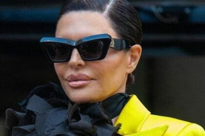 Lisa Rinna in yellow minidress at the Paris Fashion Week