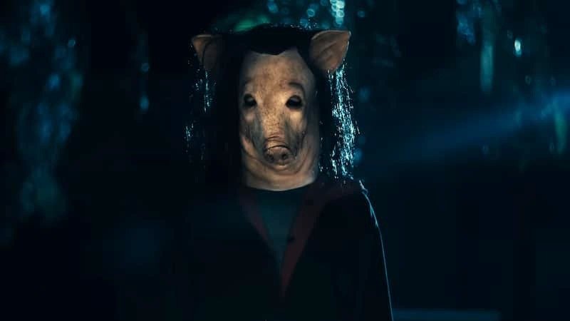 Amanda in the pig mask in Saw X